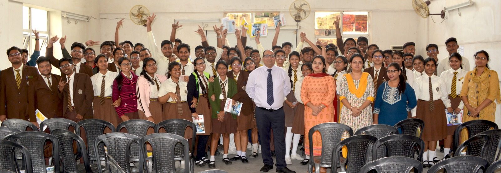 Students and teachers posing together after a session